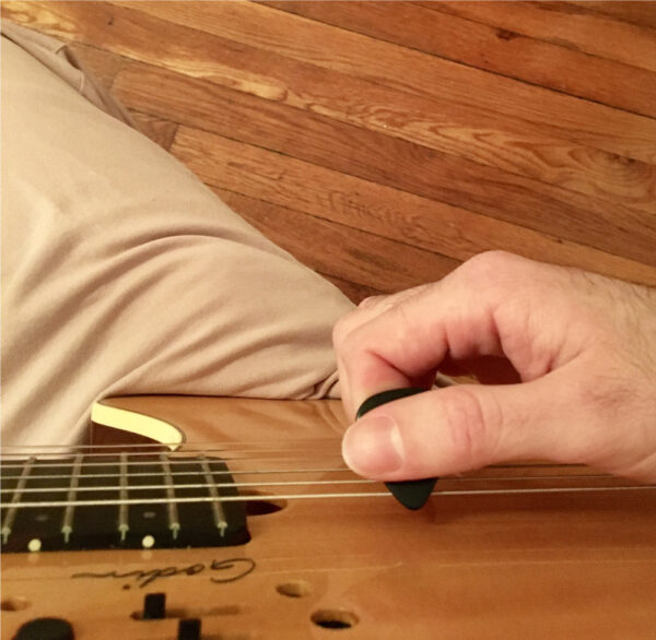 using a guitar pick example