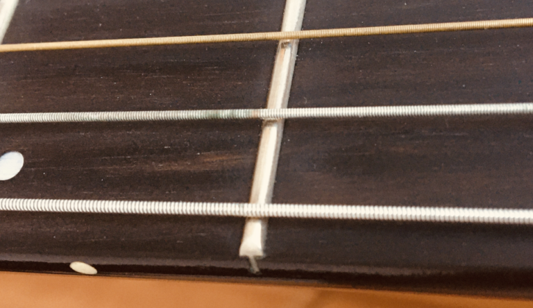 How to restring a classical guitar - JG Music Lessons